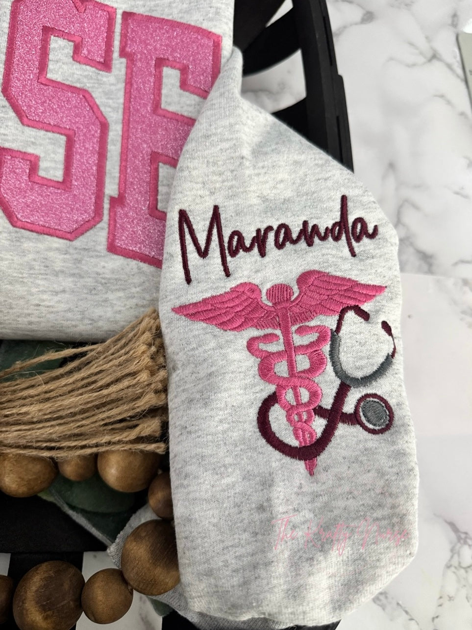 EMBROIDERED NURSE GLITTER APPLIQUÉ SWEATSHIRT