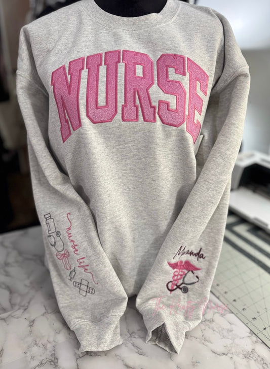EMBROIDERED NURSE GLITTER APPLIQUÉ SWEATSHIRT